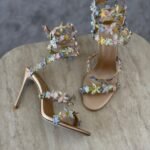 René Caovilla Eden sandals "Sculptural stiletto heel and irisdescent butterfly embellishments"