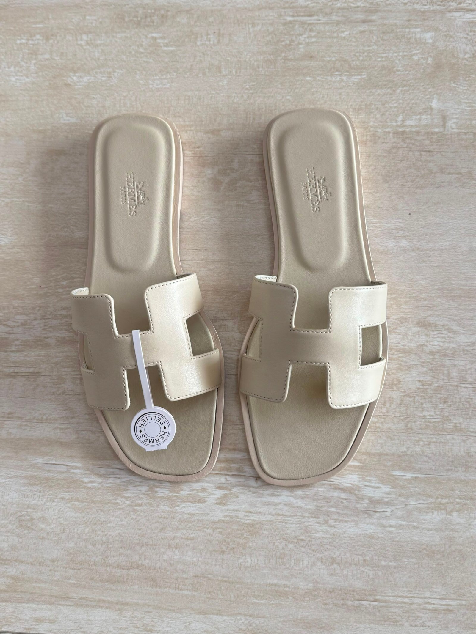 WhatsApp Image 2026-07-05 at 03.59.42 (3) Hermés Oran Sandal "Off-White" - Image 1