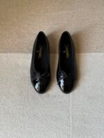 Chanel Quilted 04 "Classic two-tone ballerina style with a small bow detail"