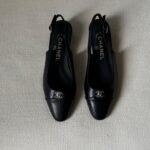 Chanel black slingback flats