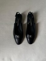 Chanel black slingback flats