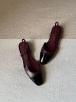 Chanel slingback shoes crafted "dark burgundy with black patent toe cap" - Image 2