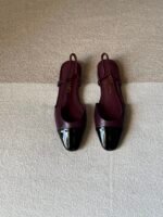 Chanel slingback shoes crafted "dark burgundy with black patent toe cap"