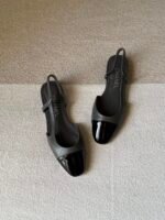 Chanel slingback shoes crafted "grey leather with black patent toe cap" - Image 2