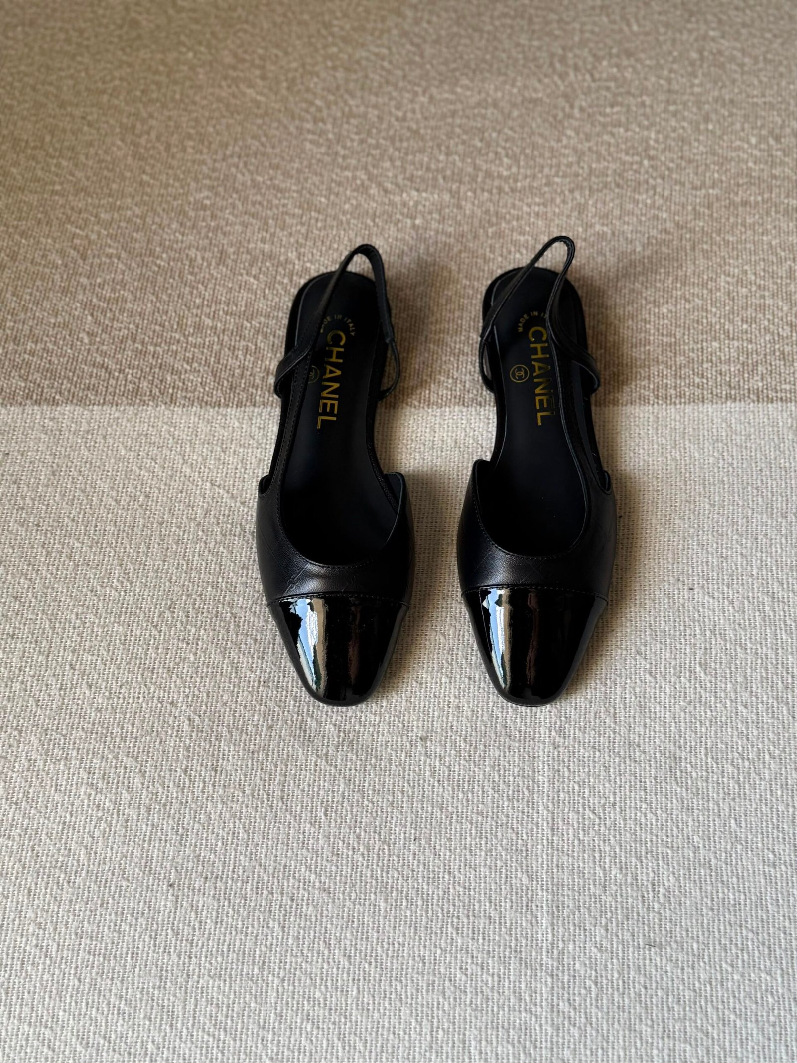 WhatsApp Image 2026-07-06 at 02.32.28 (3) Chanel slingback shoes crafted "black leather with black patent cap toe" - Image 1
