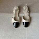 Chanel slingback shoes crafted "White with black patent toe cap"
