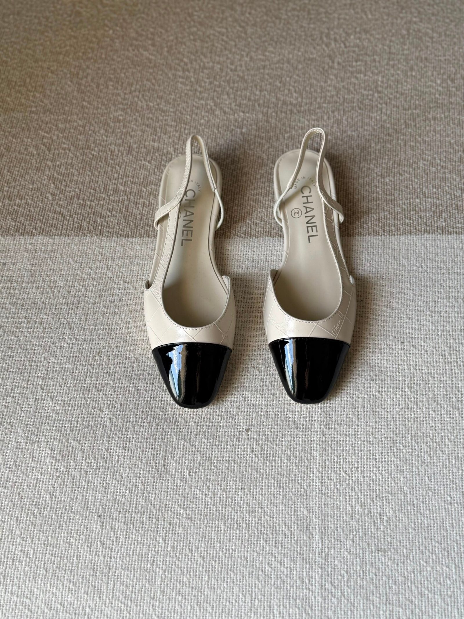 WhatsApp Image 2026-07-06 at 02.32.29 Chanel slingback shoes crafted "White with black patent toe cap" - Image 1
