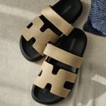 Hermès Chypre sandals "Dark Cream Leather Strap"