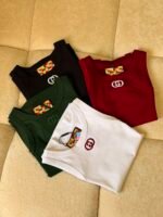 GUCCI tank top a vibrant check- patterned interior tag & a prominent embroidered emblem on the chest