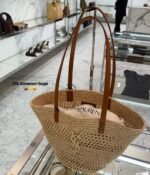 YSL "Saint Laurent Panier Small Bag in raffia with brown leather handle & a tonal Cassandre logo" - Image 3