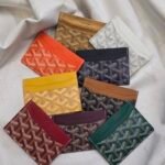 Goyard Cardholder "coated canvas featuring the signature chevron pattern"