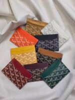 Goyard Cardholder "coated canvas featuring the signature chevron pattern"