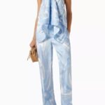 Pucci Angola-print halter top in silk twill with a light-blue swirl design and chain straps