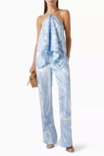 Pucci Angola-print halter top in silk twill with a light-blue swirl design and chain straps