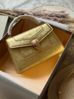 Bulgari Serpenti Forever top-handle bag with a snakehead magnetic closure - Image 7