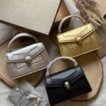 Bulgari Serpenti Forever top-handle bag with a snakehead magnetic closure