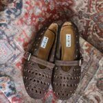 Alaïa  Vienne ballet flats perforated dark brown suede & a buckle strap