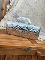 Chanel Large Metalic Mirror Calfskin Flap Bag distinct top handle & quilted texture - Image 5