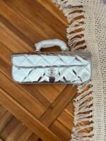 Chanel Large Metalic Mirror Calfskin Flap Bag distinct top handle & quilted texture - Image 3