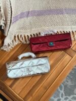 Chanel Large Metalic Mirror Calfskin Flap Bag distinct top handle & quilted texture