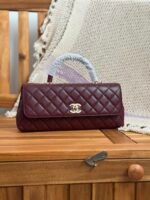 Chanel Coco Handle Eat West Flap Bag in Burgundy quilted leather with iconic gold CC lock