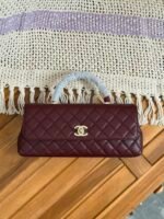 Chanel Coco Handle Eat West Flap Bag in Burgundy quilted leather with iconic gold CC lock - Image 2