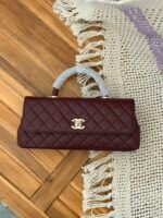 Chanel Coco Handle Eat West Flap Bag in Burgundy quilted leather with iconic gold CC lock - Image 4