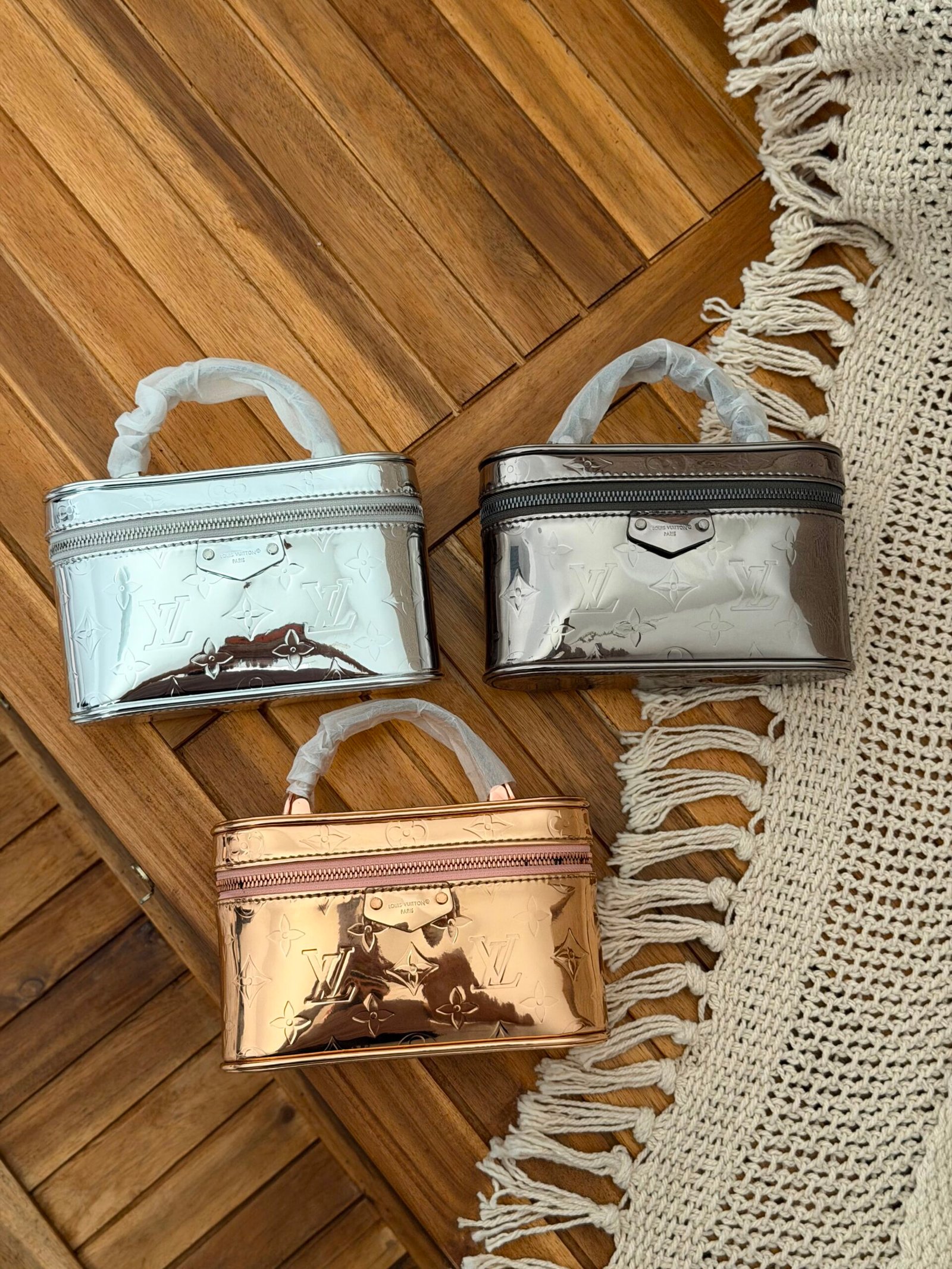 WhatsApp Image 2026-07-28 at 03.12.11 (2) Louis Vuitton vanity pouches metallic finish & embossed monogram canvas - Image 1