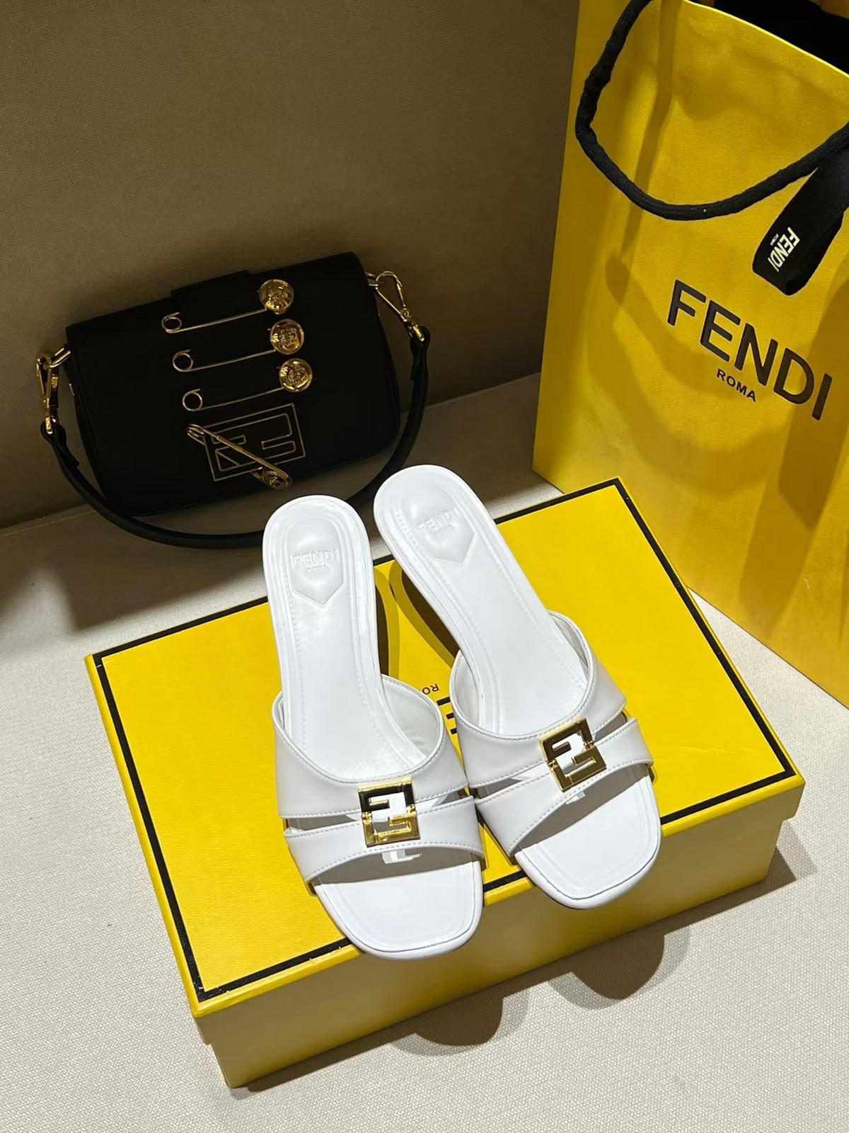 WhatsApp Image 2026-07-28 at 03.15.29 FENDI White "FFold" leather sandals - Image 1