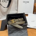 Celine Triomphe belt featuring a distinct gold metal buckle