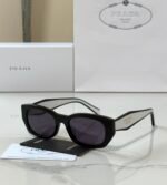 Prada PR B05S sunglasses "Black acetate pillow frame with dark grey lenses