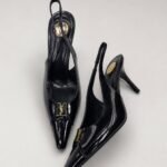 Saint Laurent Babylone slingback pumps with a golden YSL medallion accent
