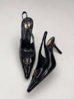 Saint Laurent Babylone slingback pumps with a golden YSL medallion accent