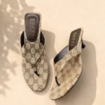 GUCCI Vittoria Thong Sandals in GG canvas with a sculpted kitten heel