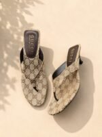 GUCCI Vittoria Thong Sandals in GG canvas with a sculpted kitten heel