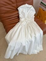 ALAÏA Linen-Blend knot midi dress structured bodice & relaxed dolman sleeves - Image 2