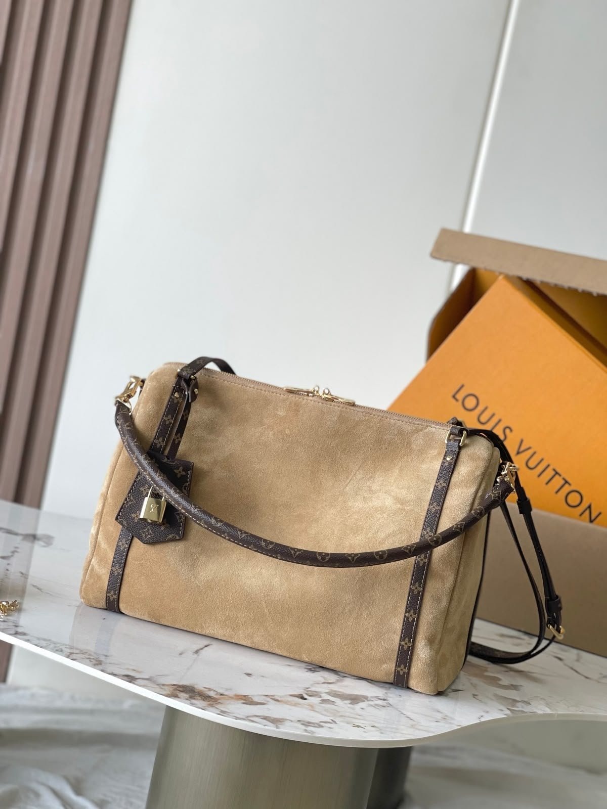 WhatsApp Image 2026-08-03 at 20.51.03 (2) Louis Vuitton Express MM handbag Hazelnut-colored and iconic monogram straps - Image 1