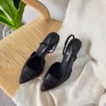 Chanel slingback heels classic colorway with a pointed cap toe