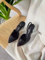 Chanel slingback heels classic colorway with a pointed cap toe