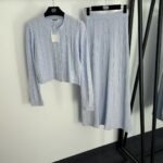 Sandro knitted set structured cardigan with pearl button details & a matching ribbed skirt - Image 5