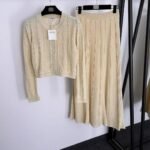Sandro knitted set structured cardigan with pearl button details & a matching ribbed skirt - Image 2