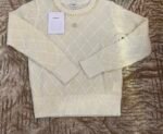Chanel sweater prominent quilted diamond pattern & delicate pearl embellishments