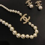 Chanel CC 100th Anniversary Faux Pearl Pendant & Earrings