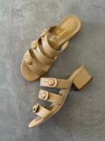 Chanel Mules in Beige Shiny Calfskin Leather with gold-tone CC turnlock logo on the straps - Image 3