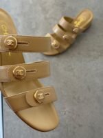 Chanel Mules in Beige Shiny Calfskin Leather with gold-tone CC turnlock logo on the straps - Image 4
