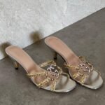 Gucci Isa Metallic Leather Heels crystal-embellished Interlocking G emblem & braided straps