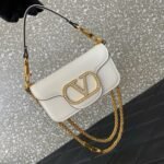 Valentino Garavani Locò small shoulder bag Vlogo detailed with Swarovski crystals
