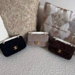 Chanel mini flap bags accented with gold-tone hardware