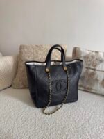 Chanel Mini Tote in Black Calfskin and gold-tone Metal diamond quilting & an interlaced leather & Chain Strap