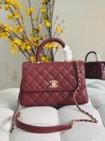 Chanel Flap Bags with Top handle chevron patterened with gold tone CC turn-lock closures
